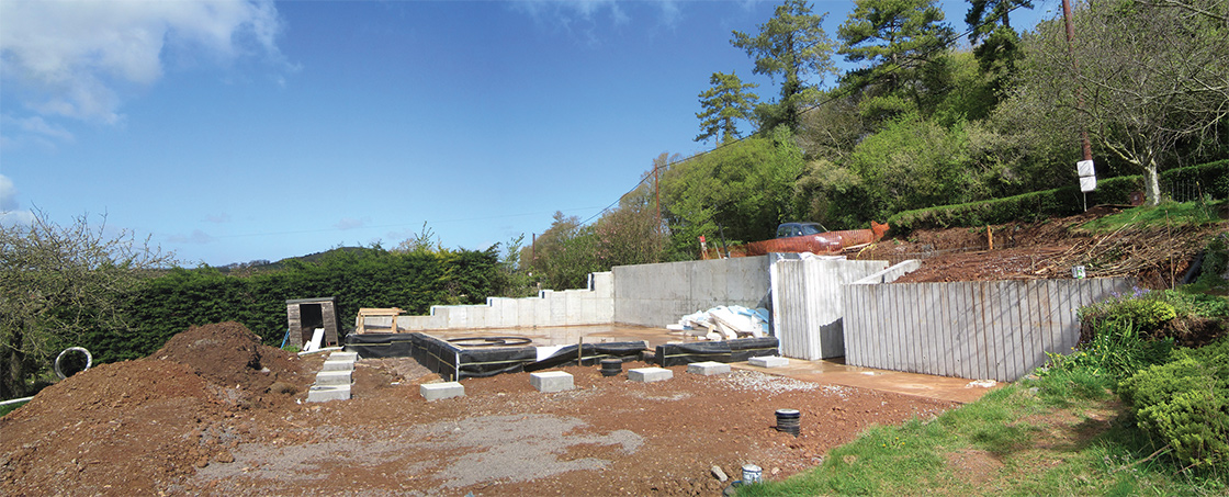 The house was built into the hillside with a retaining wall to keep to the height of the original bungalow, so the dwelling is single storey on one side and two storeys on the other