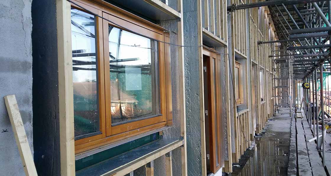 Rigid insulation installed in the I-beam webs