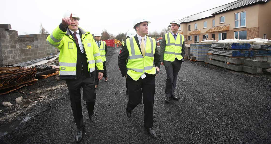 (L-r) A site visit with Patrick Durkan, Department of Housing advisor Seán Armstrong, Minister of State for Housing Damien English and Electric Ireland general manager Paul Stapleton.